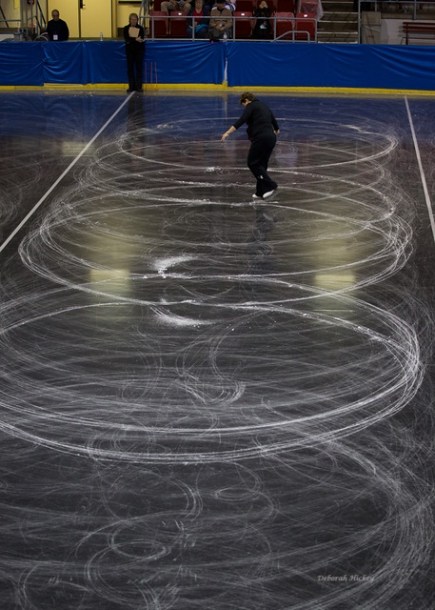 A competitor and a referee during the World Figure Championship. (credit: Deborah HIckey Photography)