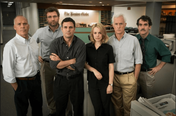 The lead actors of "Spotlight" on the Boston Globe newsroom set that was built for the film. (credit: bostonglobe.com)