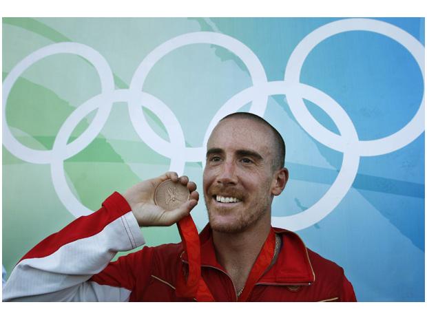 Thomas Hall with his bronze medal at the 2008 Olympics. (credit: Shaun Hall/Reuters/National Post)